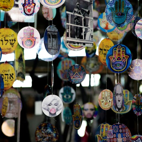 Immerse yourself in the vibrant colours and flavours of Carmel Market