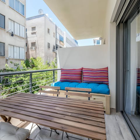 Relax with drinks on the balcony or wander to a local bar