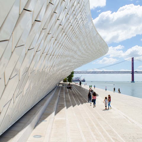 Walk ten minutes to Alcantara-Mar and catch the train for three minutes to the MAAT