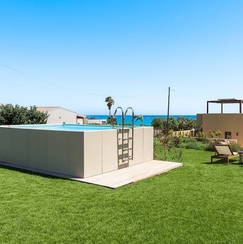 Cool off in the above-ground pool on a summer afternoon