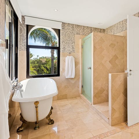 Soak in the bathtub after a day of having fun at the local beach clubs