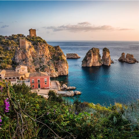 Head into the old town of Scopello, a short drive away