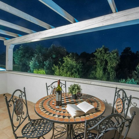 Enjoy an evening wine on the balcony as the sun goes down