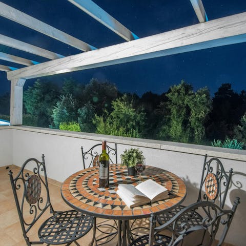 Enjoy an evening wine on the balcony as the sun goes down
