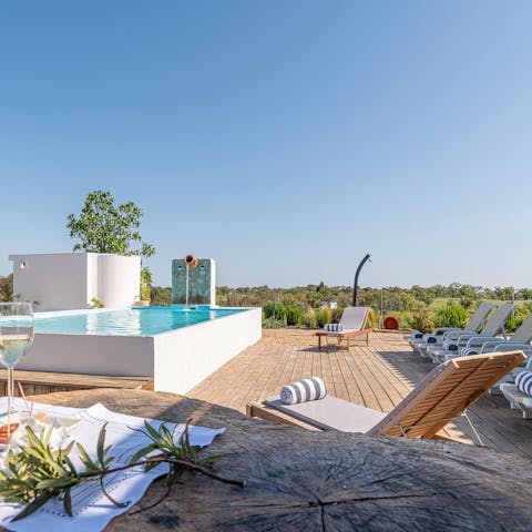 Spend a lazy day lounging by the swimming pool