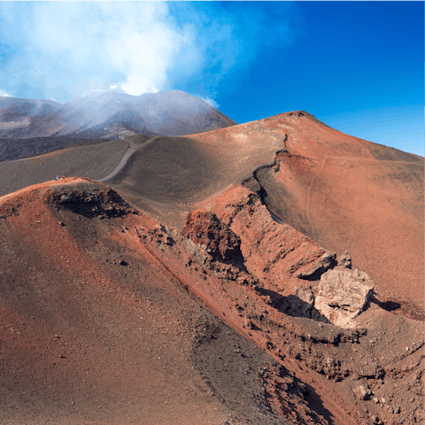 Stay on the slopes of Mount Etna and explore the surrounding national park