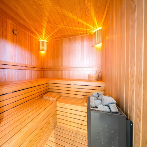 Relax and unwind in the private sauna