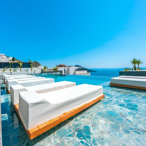 Savour sea views as you lounge by the infinity pool