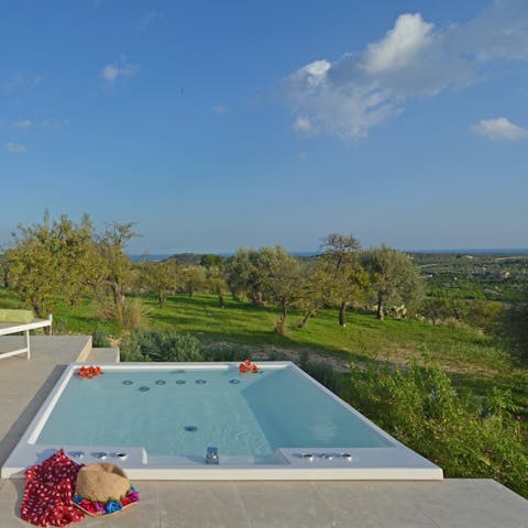 Sink into the hot tub for a soak with a view