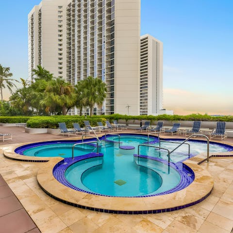 Enjoy the rooftop pool, one of two available in this building