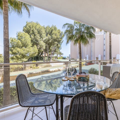 Gather for sunset drinks and tapas on the balcony