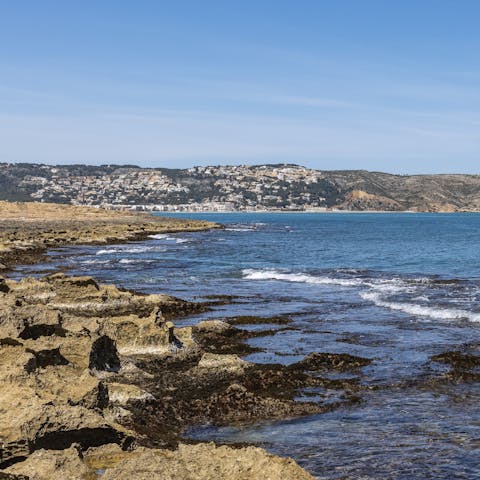 Explore the rugged shoreline of Jávea – the beach is a short walk away