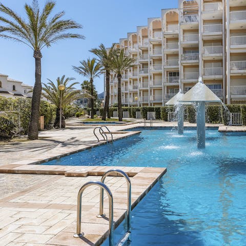 Enjoy refreshing dips in the communal pools