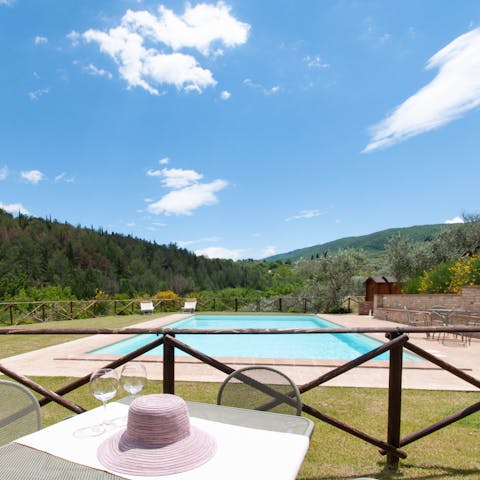 Relax at the private dining spot overlooking the shared pool