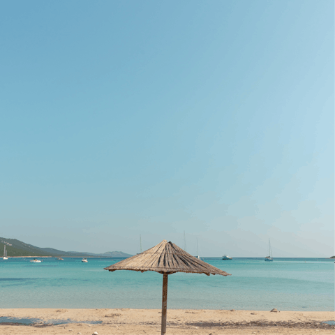 Walk down to Agios Fokas Beach, where seaside bars and picnic spots await