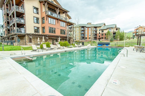 Spend leisurely afternoons lounging by the communal pool