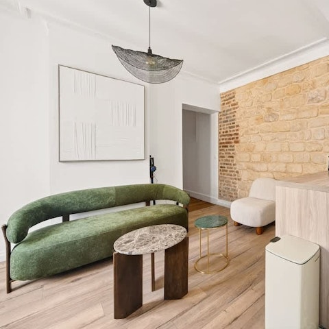Relax on the comfy sofa with a glass of Champagne