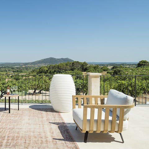Take in the spectacular views of the island from the elevated terrace