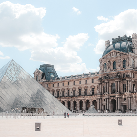 Browse the famous artworks at the Louvre Museum, a fifteen-minute stroll from this home