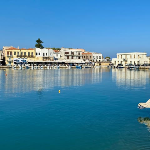 Stroll around the old harbour of Rethymno and find a friendly bar for an ouzo