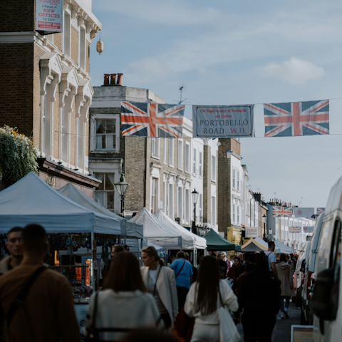 Visit Portobello Road Market, fifteen minutes away