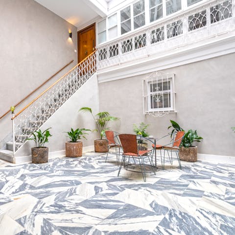 Take a breather in the building's large and light-filled lobby