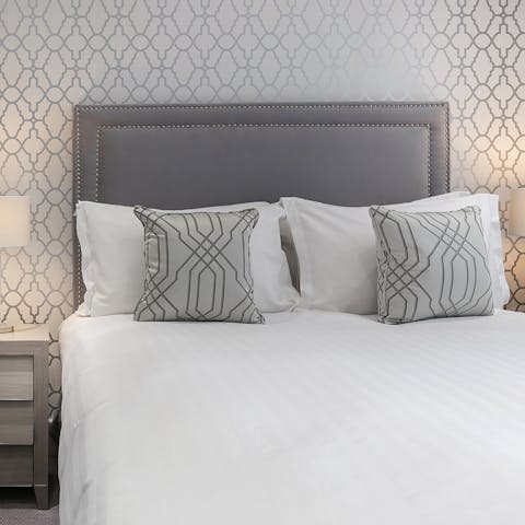 Enjoy a luxurious night's sleep in the comfortable bed