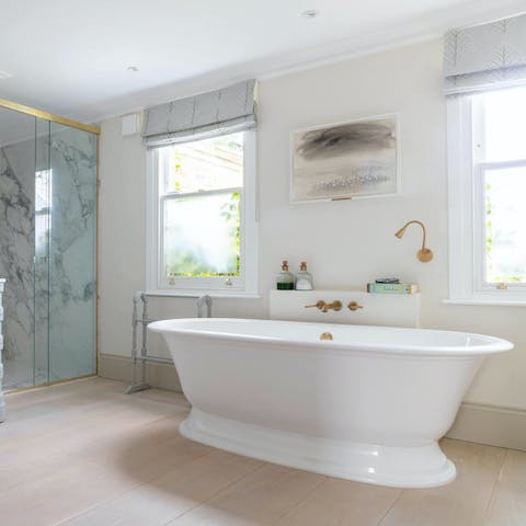 Treat yourself to an indulgent soak in the main bedroom's freestanding tub