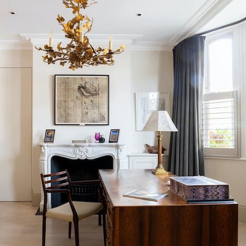 Catch up on work emails in the cosy study