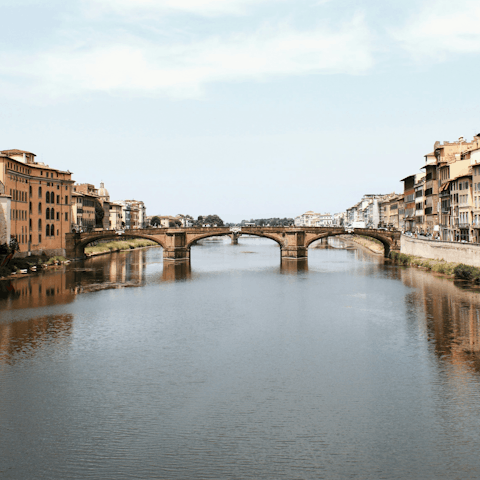 Walk along the picturesque Arno River as it weaves its way through Florence