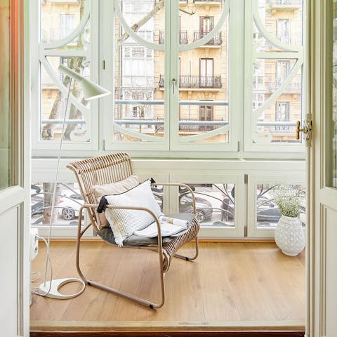 Soak up some sun with a good book in the enclosed balcony