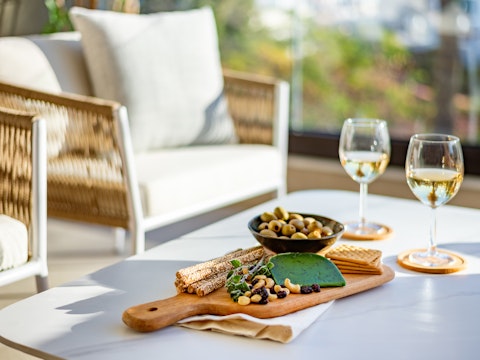 Raise a glass of chilled white wine on the light-filled outdoor terrace