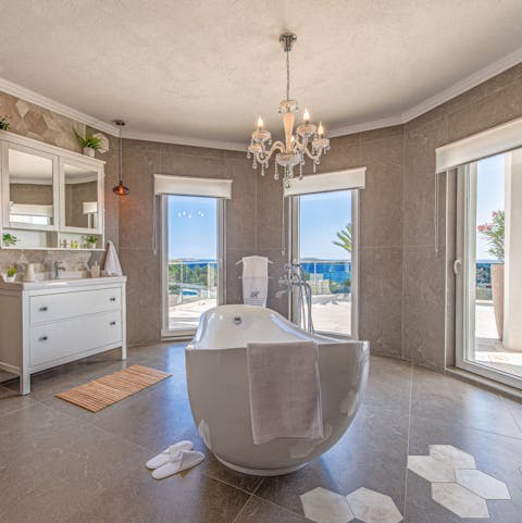 Soak your feet in this luxury bathroom, complete with a big freestanding tub