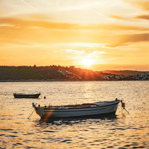 Stay in quiet coastal town of Sevid, where the locals grow grapes and olives
