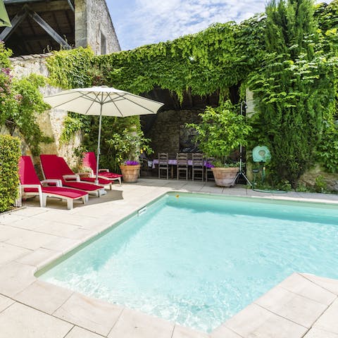 Take refreshing dips in the pool or relax in the sun by its side