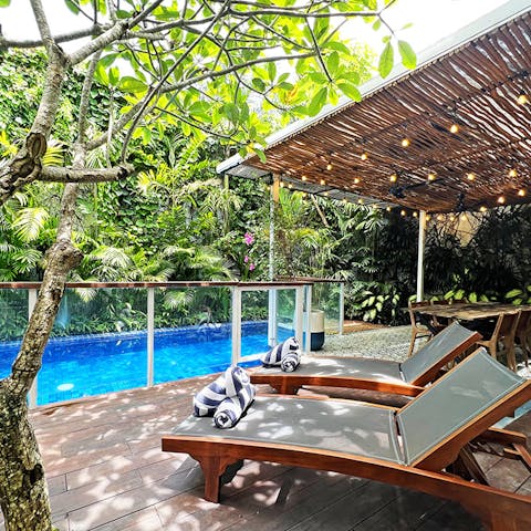 Find total peace and relaxation while lounging by the pool