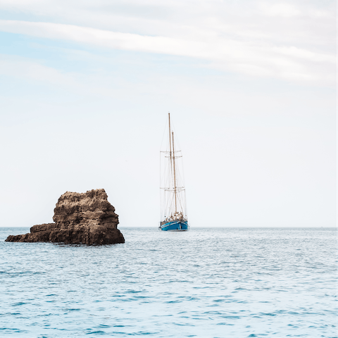 Stretch out on the golden sand of Vilamoura Beach