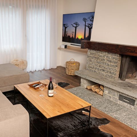 Cosy up in the evenings by the authentic fireplace