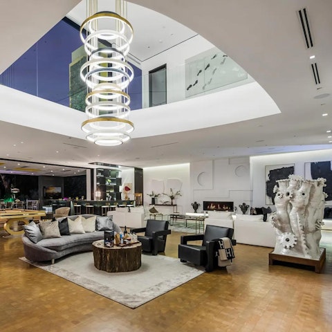 Relax in the gallery-like living space, surrounded by art