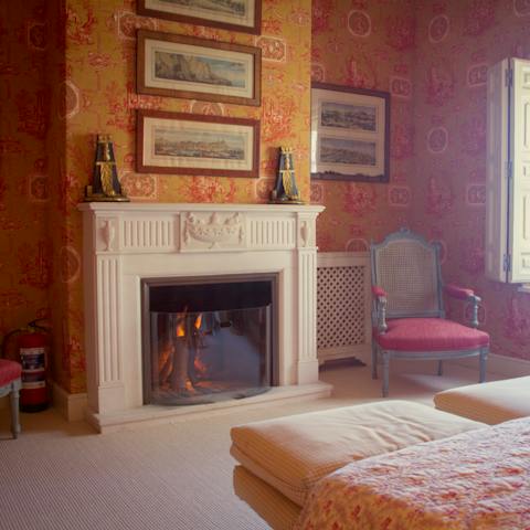 Kindle a fire and curl up with a good book and a glass of regional wine