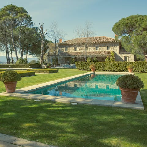 Dive into the cool waters of the stunning private pool