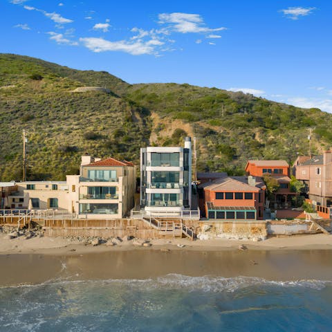 Step outside and experience the magic of beachside living