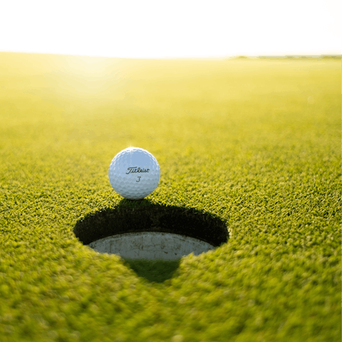 Hit a hole-in-one at Lauro Golf Resort, a short walk from home
