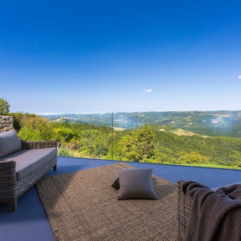 Savour sunset drinks and dreamy views from the terrace