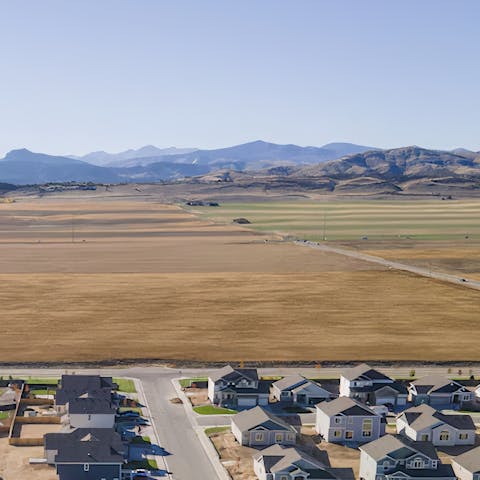 Sip on your morning coffee while looking out at a nearby mountain range