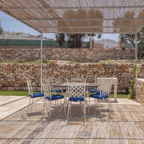 Sip a sundowner at the alfresco dining area