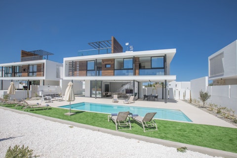 Stretch out poolside under open Mediterranean skies