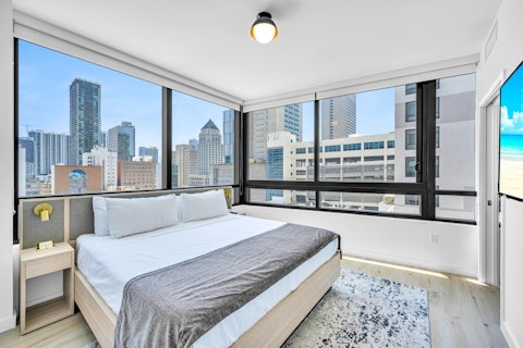 Wake to sweeping city views from the main bedroom