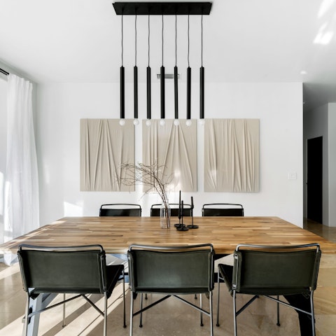 Sit down to freshly-prepared meals at the stylish dining table