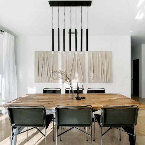 Sit down to freshly-prepared meals at the stylish dining table